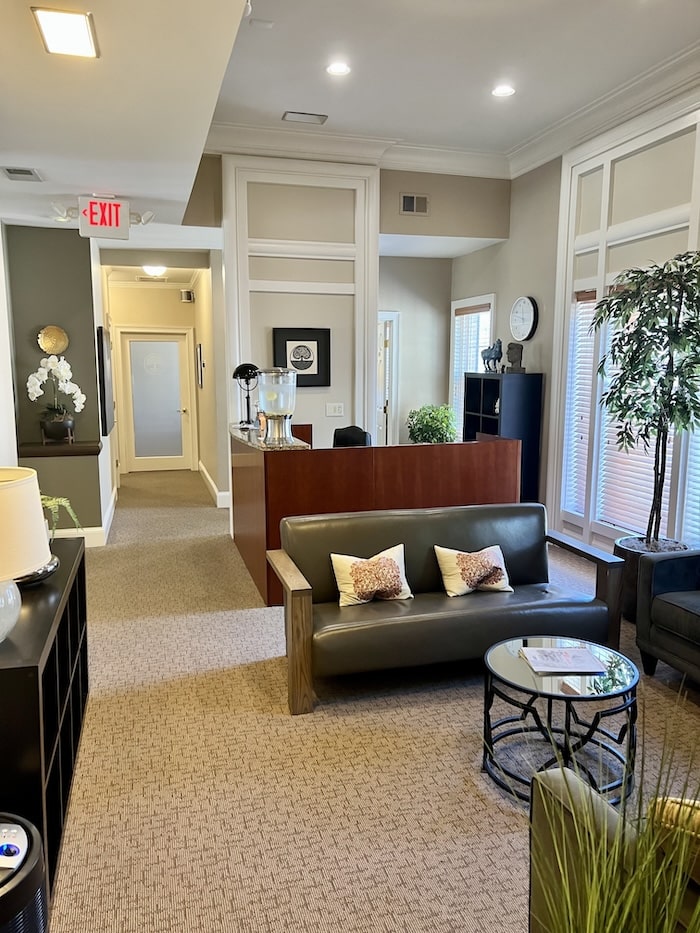 Lobby featuring reception desk and couches