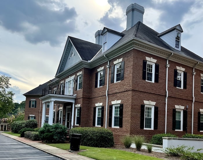 Side angle of the two-story brick office building