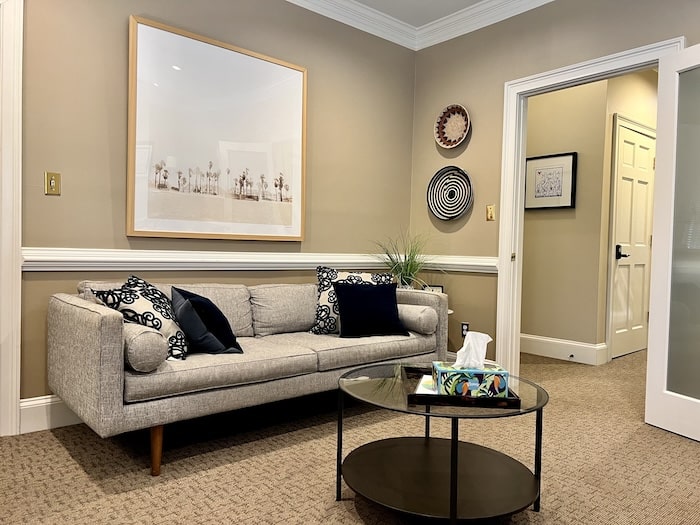 Office Light gray couch and circular coffee table